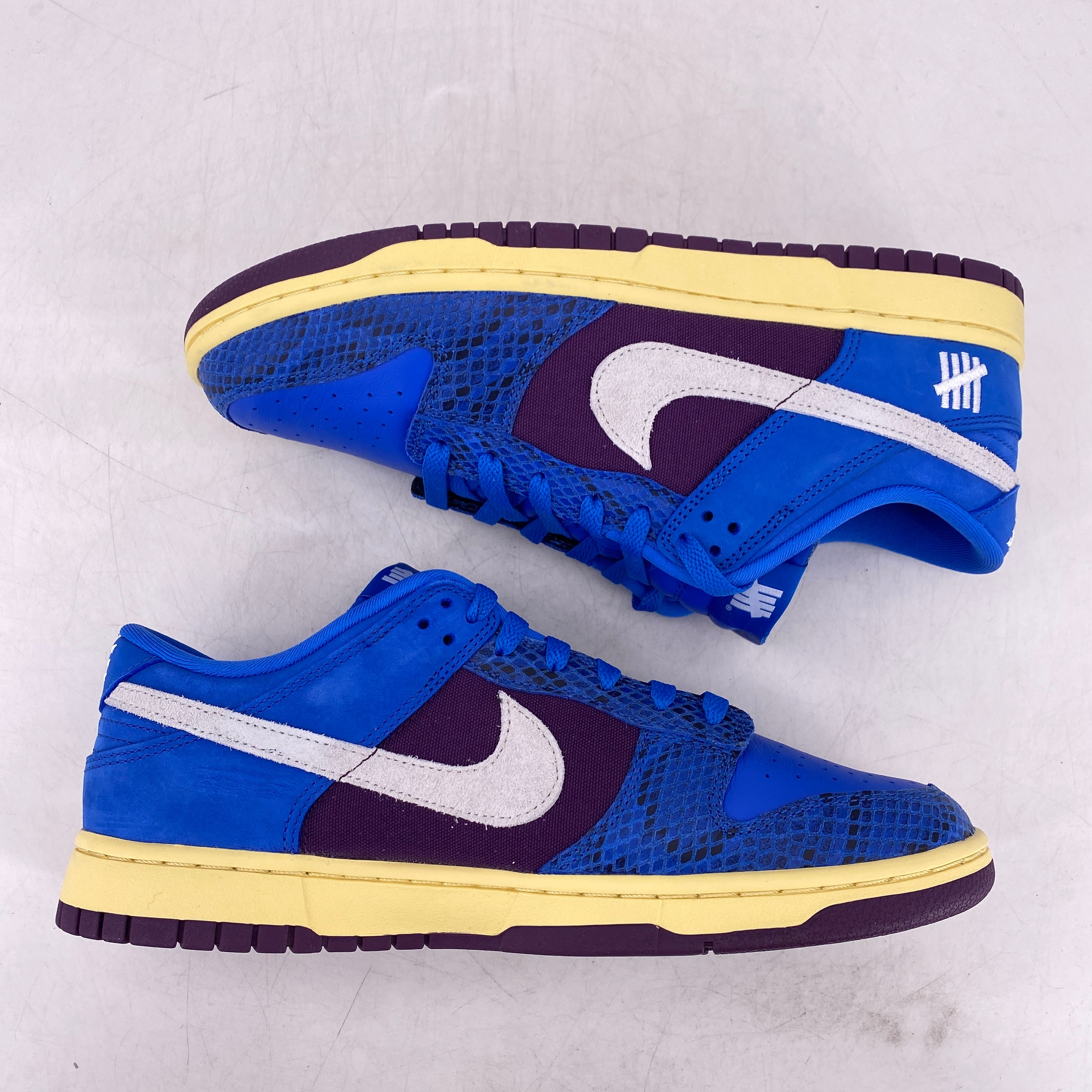 nike dunk low undefeated splatter