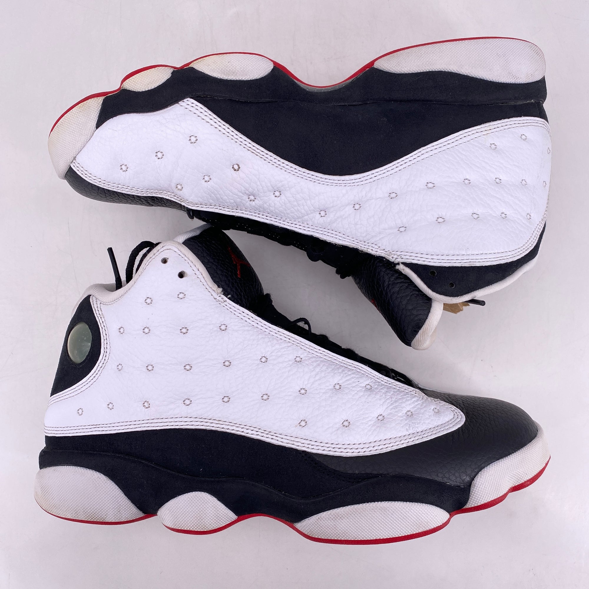 Jared Jeffries left in the Air Jordan 13 Black Red