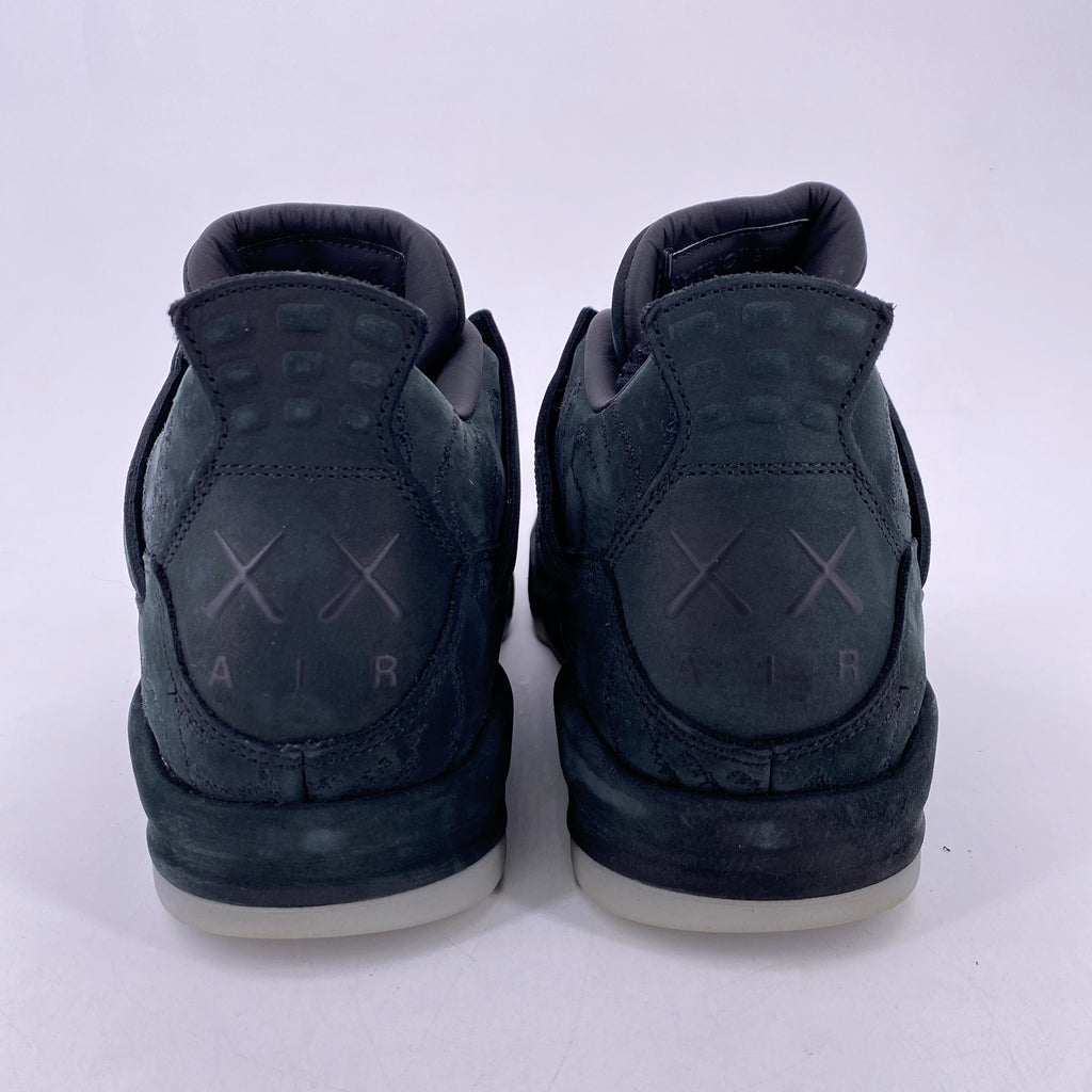 Air Jordan 4 Retro "Kaws Black" 2017 Used Size 10.5