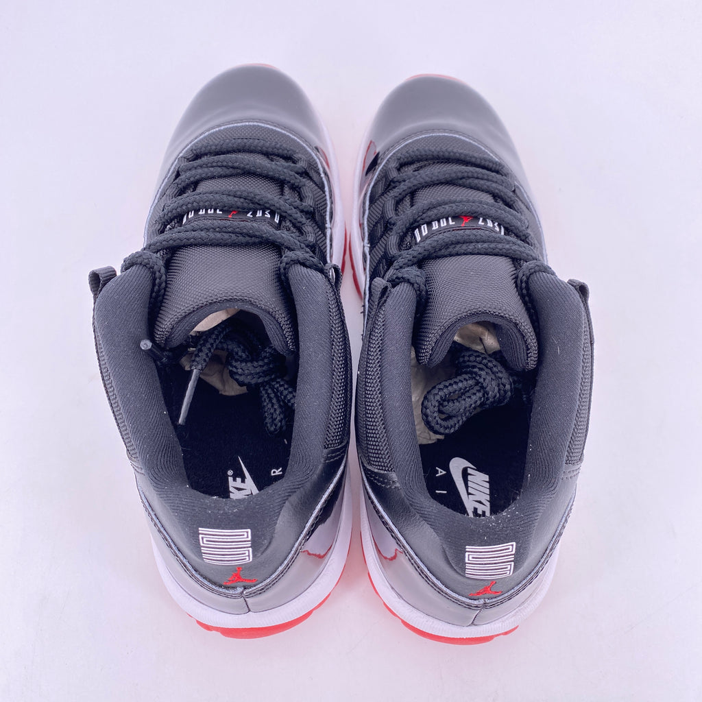 Air Jordan (GS) 11 Retro Low "Bred" 2025 Used Size 7Y