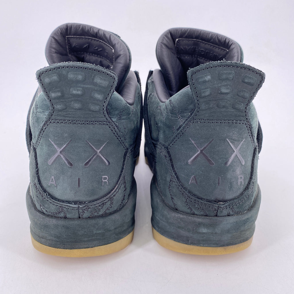 Air Jordan 4 Retro "Kaws Black" 2017 Used Size 9