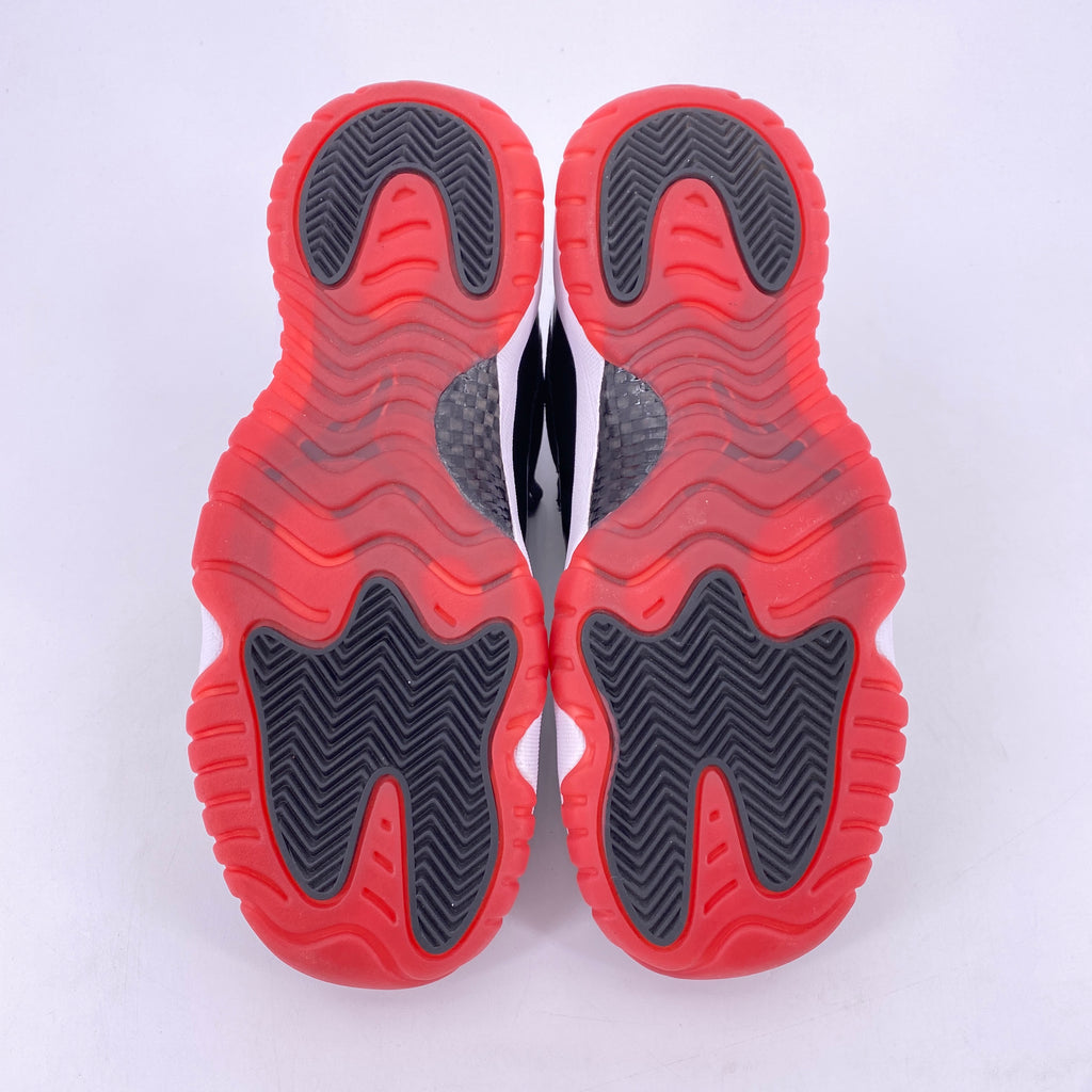Air Jordan (GS) 11 Retro Low "Bred" 2025 Used Size 7Y