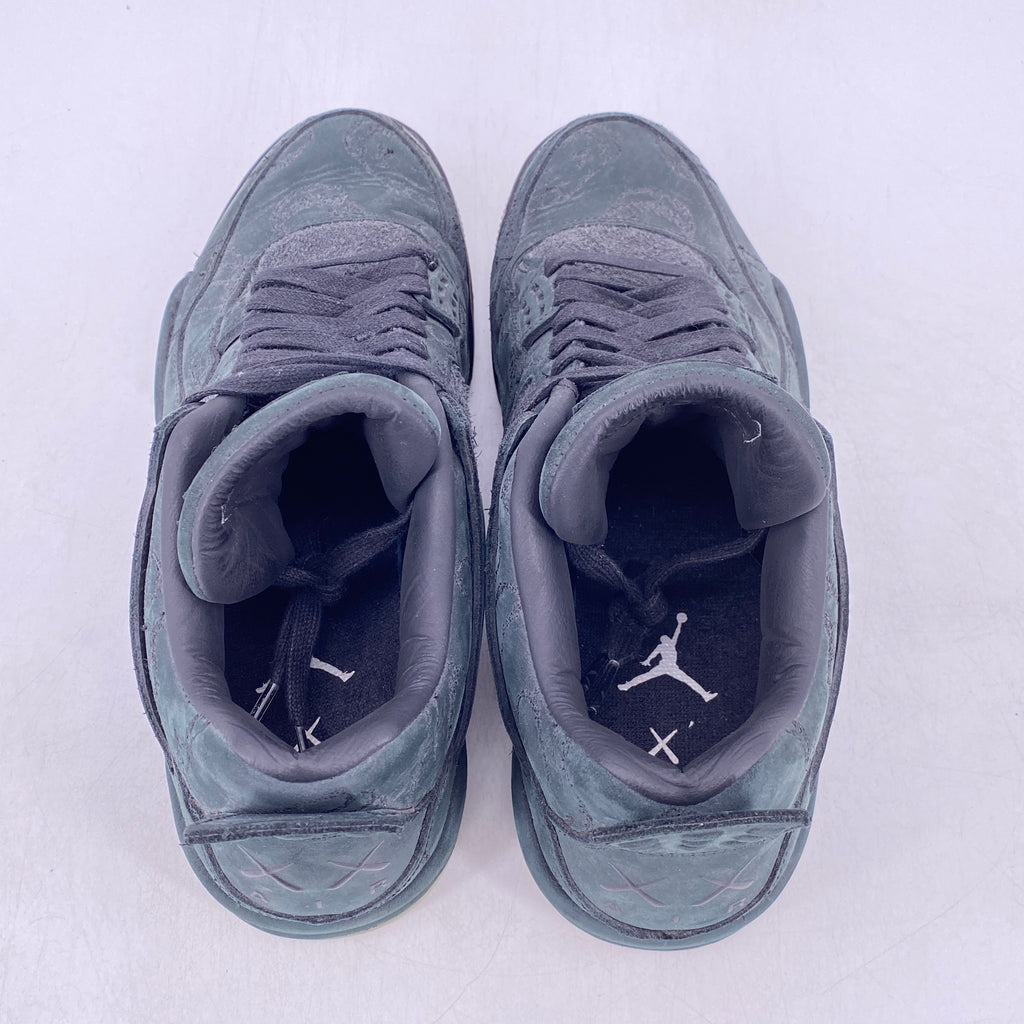 Air Jordan 4 Retro "Kaws Black" 2017 Used Size 9.5