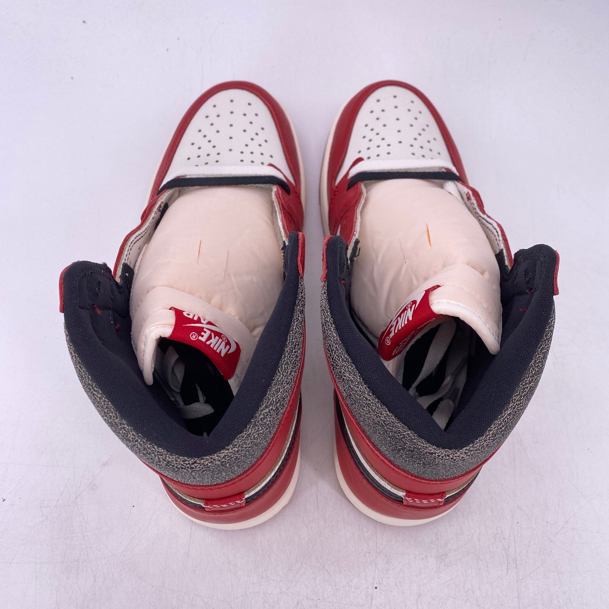 nike running tights with stripes on back pain