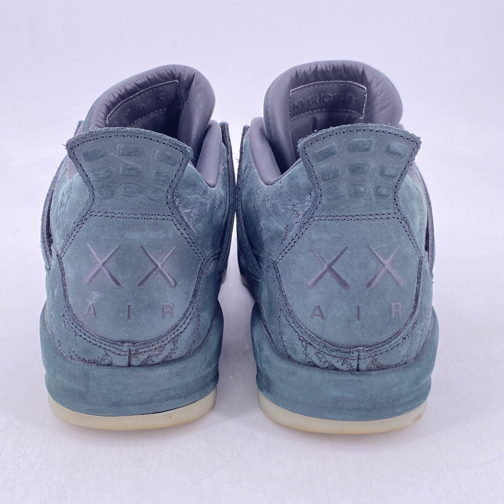 Air Jordan 4 Retro "Kaws Black" 2017 Used Size 9.5