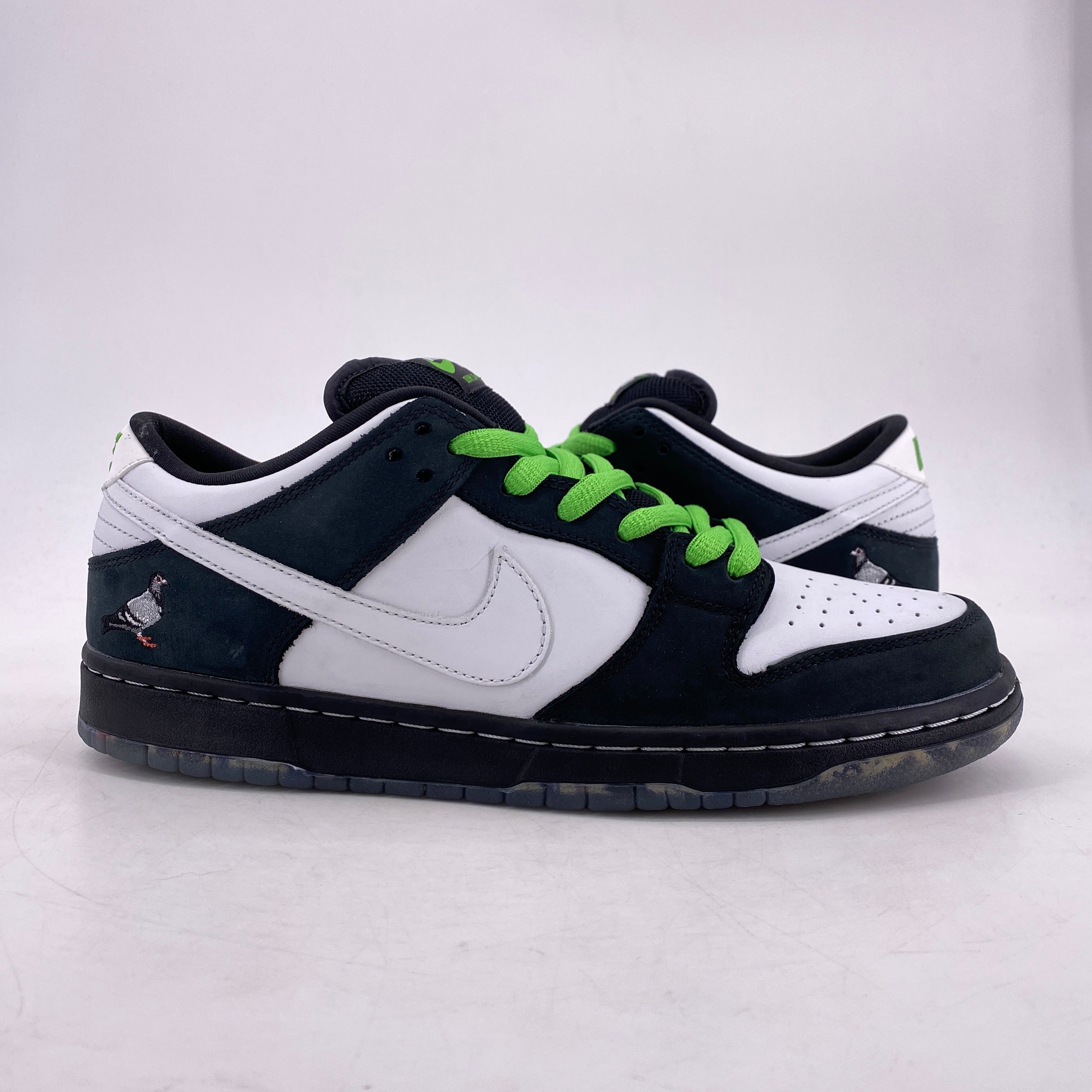 Nike sb dunk low x staple best sale